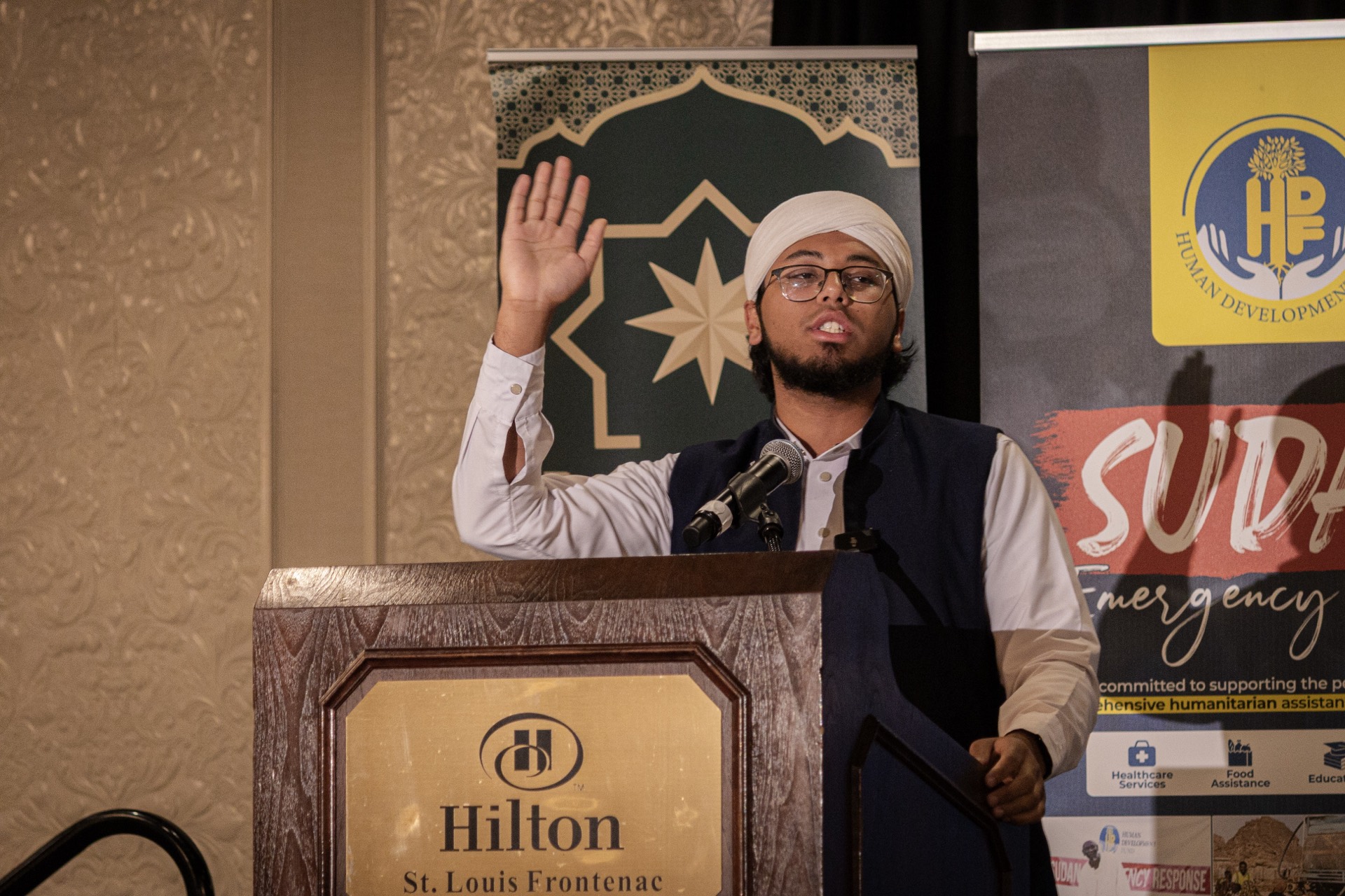 Speaker addressing the Najm x SLU MSA gathering in St. Louis